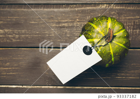 Pumpkin on old rustic wooden table. 93337182