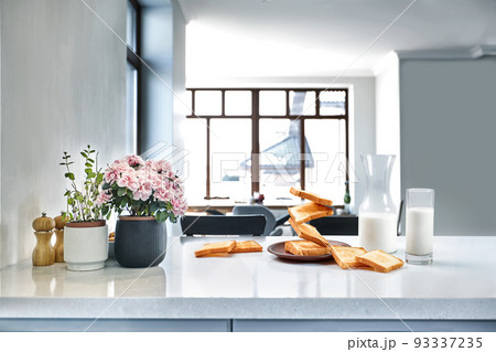 Flying toasts for breakfast and a glass of milk drink. Levitation food and healthy breakfast concept. 93337235