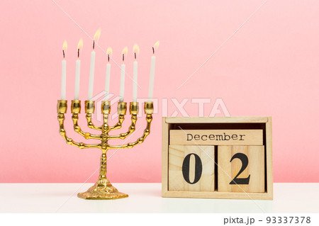 Bronze Hanukkah menorah with burning candles Bronze Hanukkah menorah with burning candles 93337378