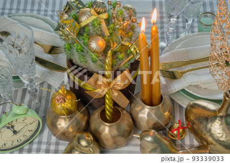 New Year's festive table setting, cutlery, decorations, New Year's decor, Christmas serving 93339033