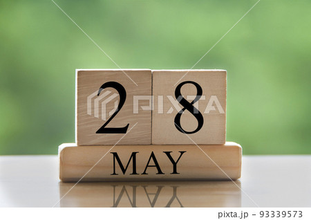 May 28 calendar date text on wooden blocks with blurred nature background. Copy space and calendar concept May 28 calendar date text on wooden blocks with blurred nature background. Copy space and calendar concept 93339573