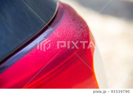 Shiny car with silver paint. Water drops on the hood. Shiny car with silver paint. Water drops on the hood. 93339790