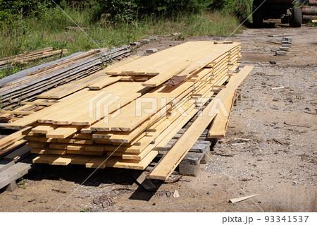 Folded finished boards at the sawmill closeup Folded finished boards at the sawmill closeup 93341537