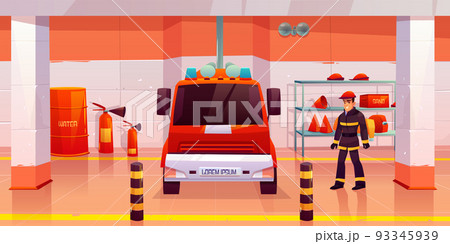 Firefighter man stand near fire engine in garage Firefighter man stand near fire engine in garage 93345939