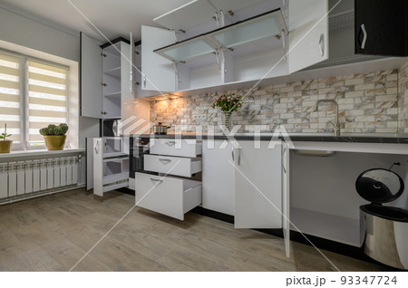 Renovated Interior for modern trendy white kitchen with doors open Renovated Interior for modern trendy white kitchen with doors open 93347724