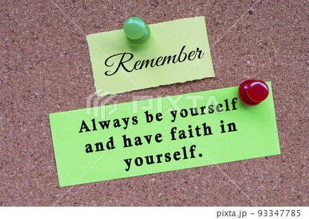Motivational quote on stick note and pinned to a cork notice board. Motivational quote on stick note and pinned to a cork notice board. 93347785