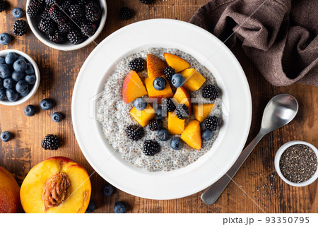 Chia pudding bowl with peach and blueberries 93350795