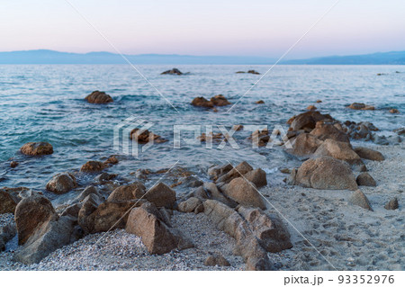 Beautiful view of orange sunset seascape with rocks in Italy. Colorful sunrise landscape Beautiful view of orange sunset seascape with rocks in Italy. Colorful sunrise landscape 93352976