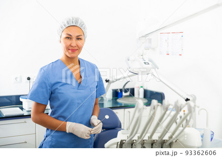 Portrait of a smiling asian woman dentist Portrait of a smiling asian woman dentist 93362606