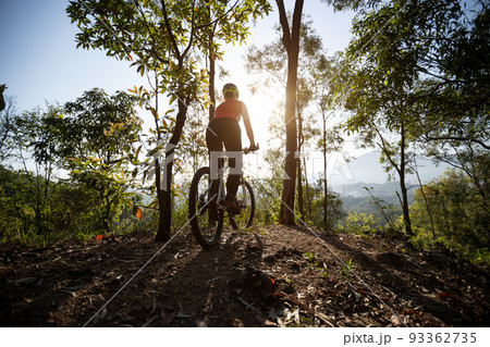 Mountain biking in spring forest Mountain biking in spring forest 93362735
