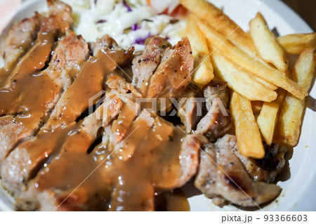 Steak and french fried food street by foodtruck, Bangkok, Thailand. 93366603
