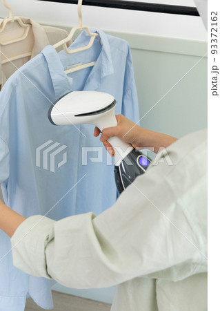 aesthetic laundry concept_ironing clothes 93372162