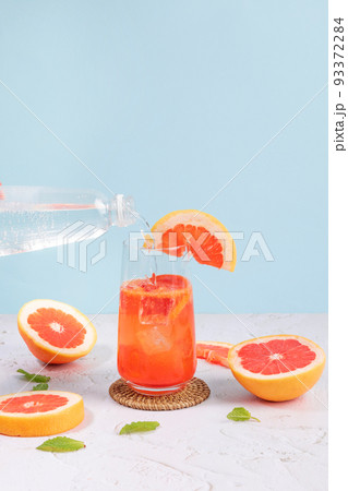summer background with grapefruit ade, juice drink with grapefruits 93372284