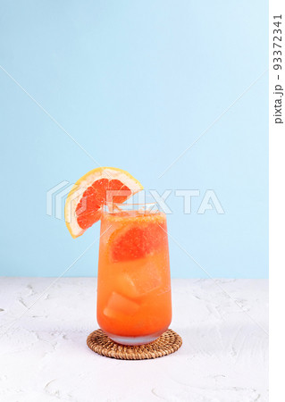 summer background with grapefruit ade, juice drink with grapefruits summer background with grapefruit ade, juice drink with grapefruits 93372341