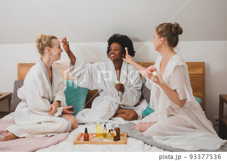 The young women are having a spa party The young women are having a spa party 93377536