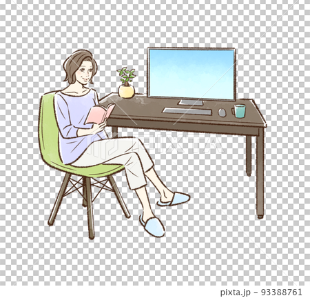 パソコンデスクの前で本を読む中年女性 93388761