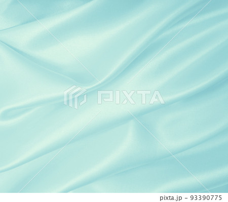 Smooth elegant blue silk or satin luxury cloth texture as abstract background. Luxurious background design Smooth elegant blue silk or satin luxury cloth texture as abstract background. Luxurious background design 93390775