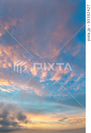 Fantastic clouds at sunrise, vertical panoramaの写真素材