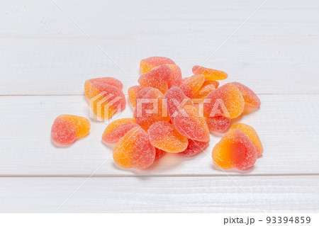 Colorful candies on wooden background Colorful candies on wooden background 93394859