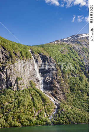 Beautiful and imposing Norwegian fjord in spring with its waterfalls 93395929