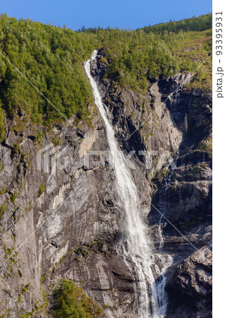 Beautiful and imposing Norwegian fjord in spring with its waterfalls 93395931