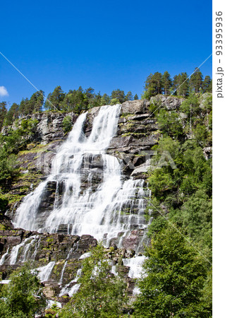 View of Tvindefossen or Tvinnefossen waterfall near Voss in Norway View of Tvindefossen or Tvinnefossen waterfall near Voss in Norway 93395936