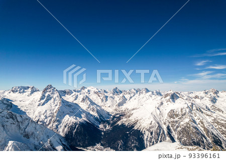 snowy mountains and clear skies  93396161