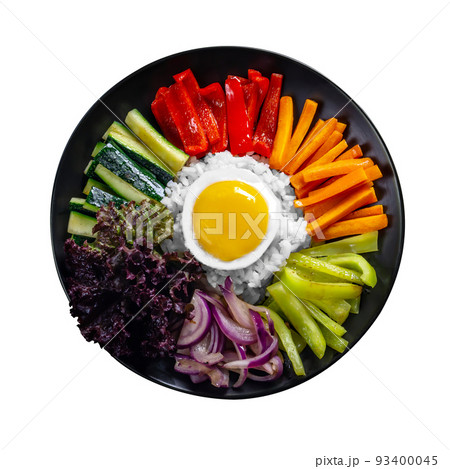 Close-up of Korean dish, isolate, variety of appetizers with vegetables and eggs. Diet. bibimbap. Top view. Round plate. 93400045