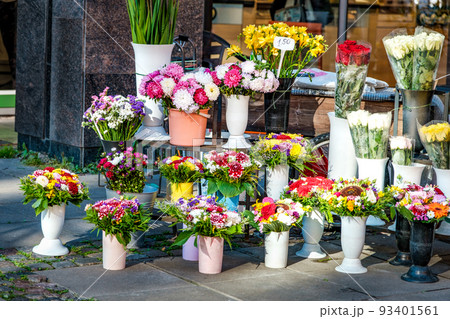 street sale of flowers. bouquets of various beautiful flowers on the street. street sale of flowers. bouquets of various beautiful flowers on the street. 93401561