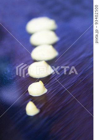 Assorted sushi food on a black slate plate 93402500