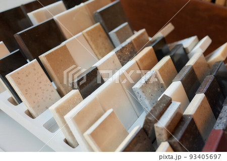 Exposition of ceramics in a showroom new tiling option for floors and walls for home building improvement works. Exposition of ceramics in a showroom new tiling option for floors and walls for home building improvement works. 93405697