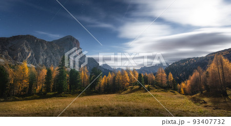 Full moon over the mountains in Dolomites alps at starry night 93407732