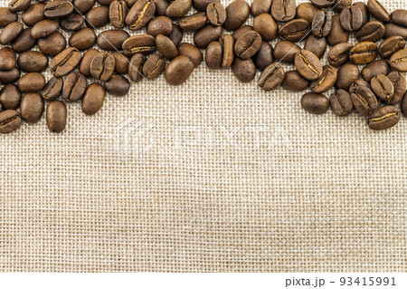 Burlap Sackcloth Canvas and Coffee Beans Placed Round Photo Background. Copy Space. Coffee Border Burlap Sackcloth Canvas and Coffee Beans Placed Round Photo Background. Copy Space. Coffee Border 93415991