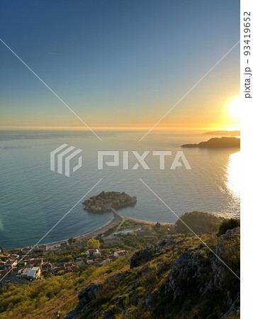 View from the mountain to the Sveti Stefan island at sunset View from the mountain to the Sveti Stefan island at sunset 93419652