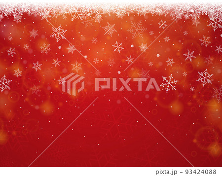クリスマスに使える雪の結晶と赤いキラキラ背景 93424088