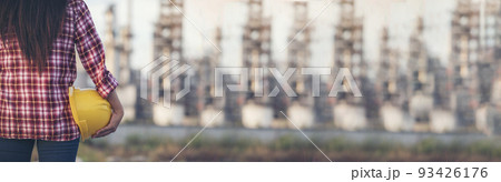 Banner Woman worker hands holding hardhat yellow work helmet Construction Engineer. Panorama Refinery woman worker industry hand hold yellow worker helmet hard hat. Refinery industry with copy space Banner Woman worker hands holding hardhat yellow work helmet Construction Engineer. Panorama Refinery woman worker industry hand hold yellow worker helmet hard hat. Refinery industry with copy space 93426176