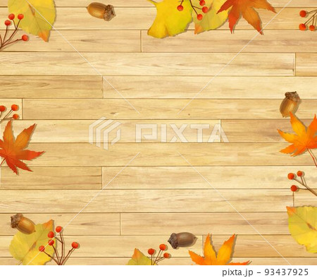 ぬくもりのある色調の木目の板の上に秋の紅葉した葉っぱと木の実のおしゃれな壁紙背景素材 93437925