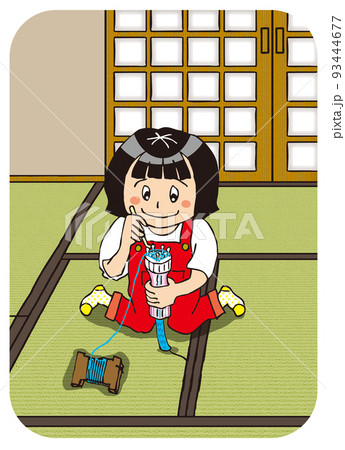 畳の和室でリリヤンで遊ぶレトロな女の子 93444677