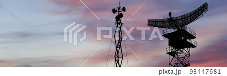 Air defense radars of military mobile anti aircraft systems, modern army industry on the background of the sunset orange sky, Russia 93447681