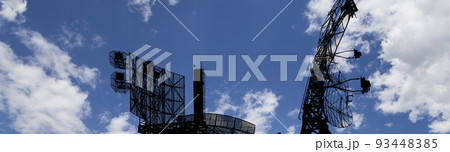 Air defense radars of military mobile anti aircraft systems, modern army industry on background beautiful clouds and sky, Russia 93448385