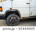 A rusty car that once carried children 93449405
