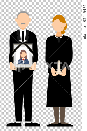 一對老夫婦站著，手裡拿著女兒的肖像和臨時的太平間 93449423