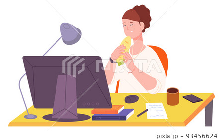 Woman eating lunch at computer desk. Office meal break Woman eating lunch at computer desk. Office meal break 93456624