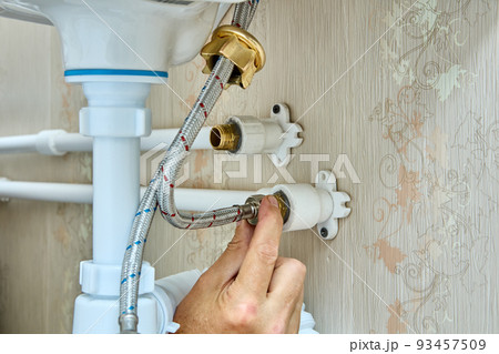 Attached faucet to water supply using braided connecting hose. 93457509