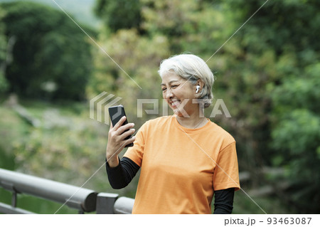 Happy senior woman taking selfie photo. 93463087