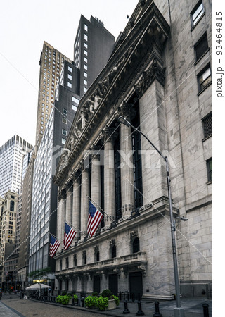 Front of the 1908 New York Stock Exchange on Broad Street with American flags on a front Front of the 1908 New York Stock Exchange on Broad Street with American flags on a front 93464815