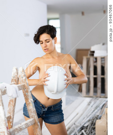 Sexy woman posing in construction site 93467066