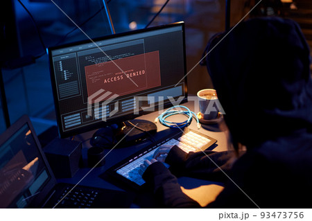 hacker using computer virus for cyber attack 93473756
