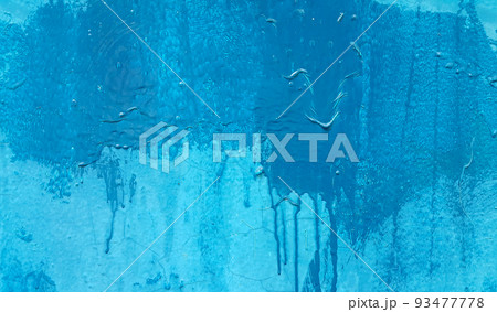 Blue painted wall texture with stains and smudges Blue painted wall texture with stains and smudges 93477778