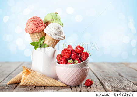 Various ice cream in waffle cones Various ice cream in waffle cones 93482375
